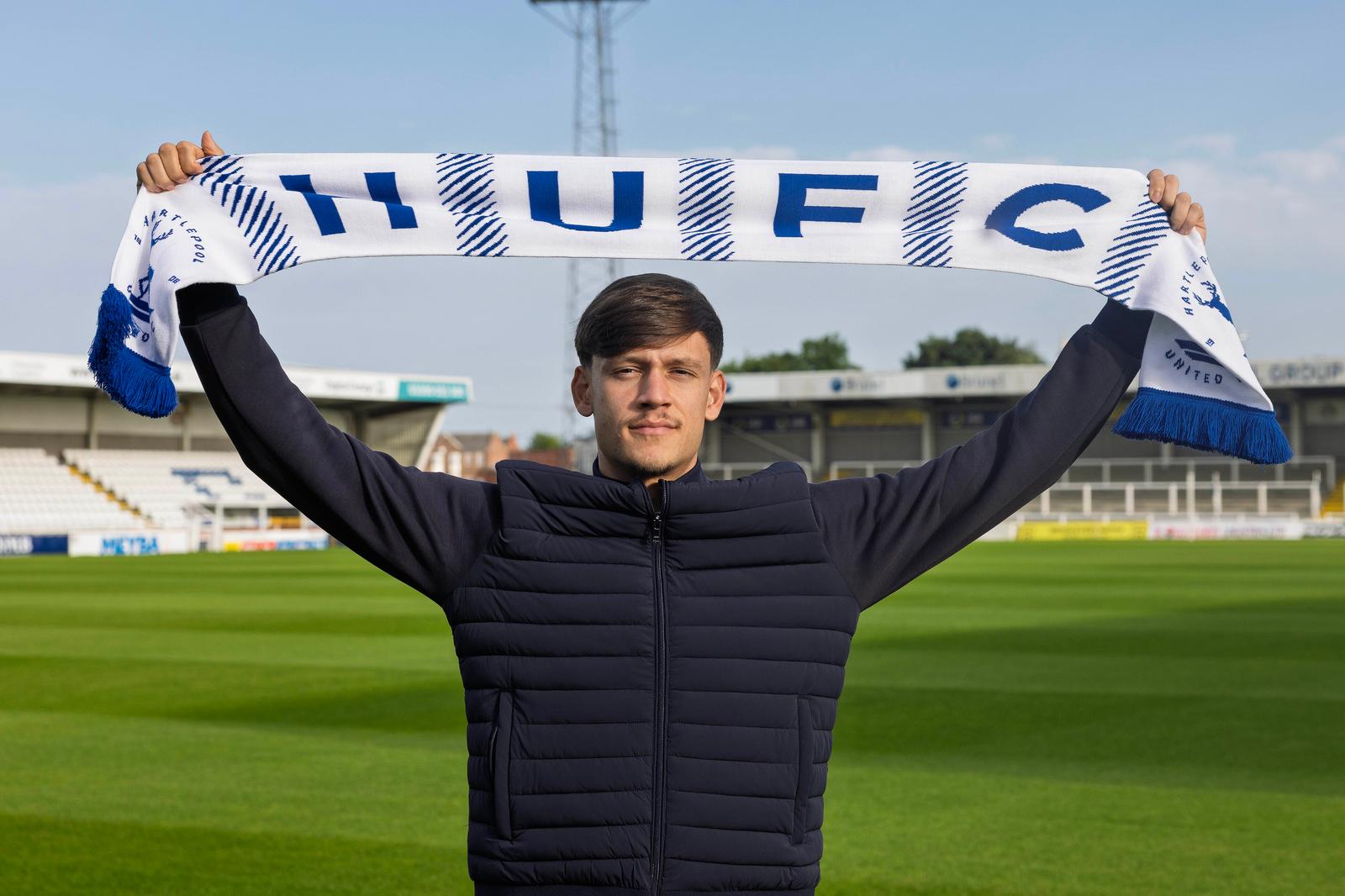 Chris Popov at Victoria Park after completing his move to Hartlepool United from Leicester City.